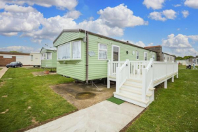 Caravan with decking at Highfield Grange Holiday Park in Essex ref 26260E